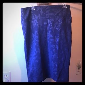 LuLaRoe Cassie skirt l purple w/ embossed swallows